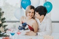 Young Asian couple celebrating new year together Royalty Free Stock Photo