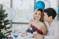 Young Asian couple celebrating new year together Royalty Free Stock Photo