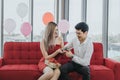 Young Asian couple celebrating new year together Royalty Free Stock Photo