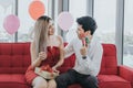 Young Asian couple celebrating new year together Royalty Free Stock Photo