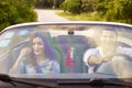 Young asian couple enjoying a ride Royalty Free Stock Photo