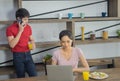 Young Asian couple, Focusing of to Woman are looking at computer laptop