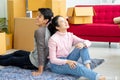 Young Asian couple lovers move the cardboard boxes to new family house Royalty Free Stock Photo