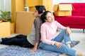 Young Asian couple lovers move the cardboard boxes to new family house Royalty Free Stock Photo