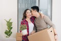 Young asian couple moving to a new apartment together relocation Royalty Free Stock Photo