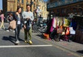 Young Asian couple shopping in Brick Lane, East London, UK