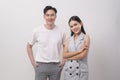 Young Asian couple smiling over white background Royalty Free Stock Photo