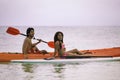 Young asian couple in their kayak Royalty Free Stock Photo