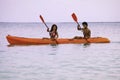 Young asian couple in their kayak Royalty Free Stock Photo