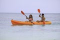 Young asian couple in their kayak Royalty Free Stock Photo