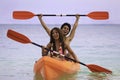 Young asian couple in their kayak Royalty Free Stock Photo