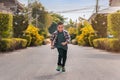 Young asian cute kid or pupil running into school at morning,Back to school concept, Selective focus Royalty Free Stock Photo