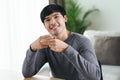 Young Asian deaf disabled man using Sign Language to communicate with other people Royalty Free Stock Photo