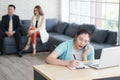 Young Asian disabled businesswoman sitting in wheelchair  working her job and use smartphone talking with her customer, the Royalty Free Stock Photo