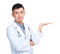 Young asian doctor present