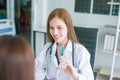 Young asian doctor showing hand press syringe ready to inject shot Vaccination and medical injection image.Healthcare, Medical