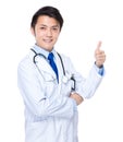 Young Asian doctor with thumb up Royalty Free Stock Photo