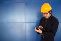 Young Asian engineer man writing on tablet Royalty Free Stock Photo