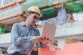 Young asian engineers are working on the construction site Royalty Free Stock Photo