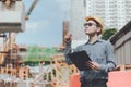 Young asian engineers are working on the construction site Royalty Free Stock Photo