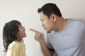 Faghter and Little Baby Daughter Arguing Royalty Free Stock Photo