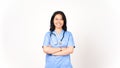Young Asian female doctor folding arms smiling and looking at camera isolated on white background Royalty Free Stock Photo