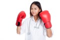 Young Asian female doctor ready to fight Royalty Free Stock Photo