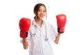 Young Asian female doctor ready to fight Royalty Free Stock Photo