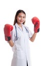 Young Asian female doctor ready to fight. Royalty Free Stock Photo