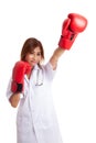 Young Asian female doctor win the fight Royalty Free Stock Photo