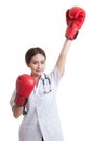 Young Asian female doctor win the fight. Royalty Free Stock Photo