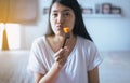 Young asian female eating fresh fruits papaya slices,Concept healthy food Royalty Free Stock Photo