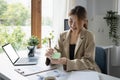 Young female entrepreneur working in modern home office. Royalty Free Stock Photo