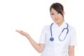 Young asian female nurse showing blank sign Royalty Free Stock Photo