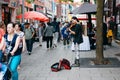 Young Asian female street musician playing violin Royalty Free Stock Photo