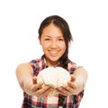 Young Asian girl holds cerebrum model in her hand