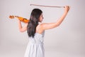 Young asian girl playing violin Royalty Free Stock Photo