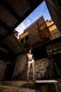 Young asian girl posing in abandoned building Royalty Free Stock Photo