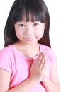 Young asian girl put her hands together and pray Royalty Free Stock Photo