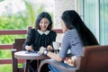 Asian girls playing domino game Royalty Free Stock Photo