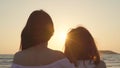 Young Asian lesbian couple kissing near beach. Beautiful women lgbt couple happy relax enjoy love and romantic moment when sunset Royalty Free Stock Photo