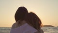 Young Asian lesbian couple kissing near beach. Beautiful women lgbt couple happy relax enjoy love and romantic moment when sunset Royalty Free Stock Photo