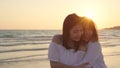 Young Asian lesbian couple kissing near beach. Beautiful women lgbt couple happy relax enjoy love and romantic moment when sunset Royalty Free Stock Photo