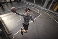 Young asian male basketball player attempting a dunk Royalty Free Stock Photo