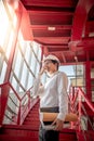 Asian male engineer holding files at construction site Royalty Free Stock Photo