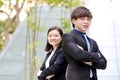 Young Asian male and female business executive smiling portrait Royalty Free Stock Photo