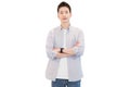 Young Asian man in casual gray shirt.He is standing with arms folded feeling confidence to work. Smart working concept Royalty Free Stock Photo