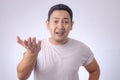 Young Asian Man Disappointed Gesture Royalty Free Stock Photo