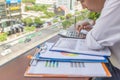 Young Asian man doing monthly financial reports Royalty Free Stock Photo