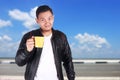 Young Asian Man Enjoy a Cup of Coffee Royalty Free Stock Photo